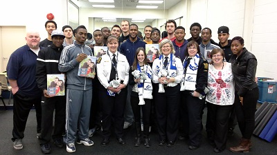 The men's basketball team after completing the CPR course