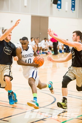 Akai Nettey drives to the rim against Manchester Spartans