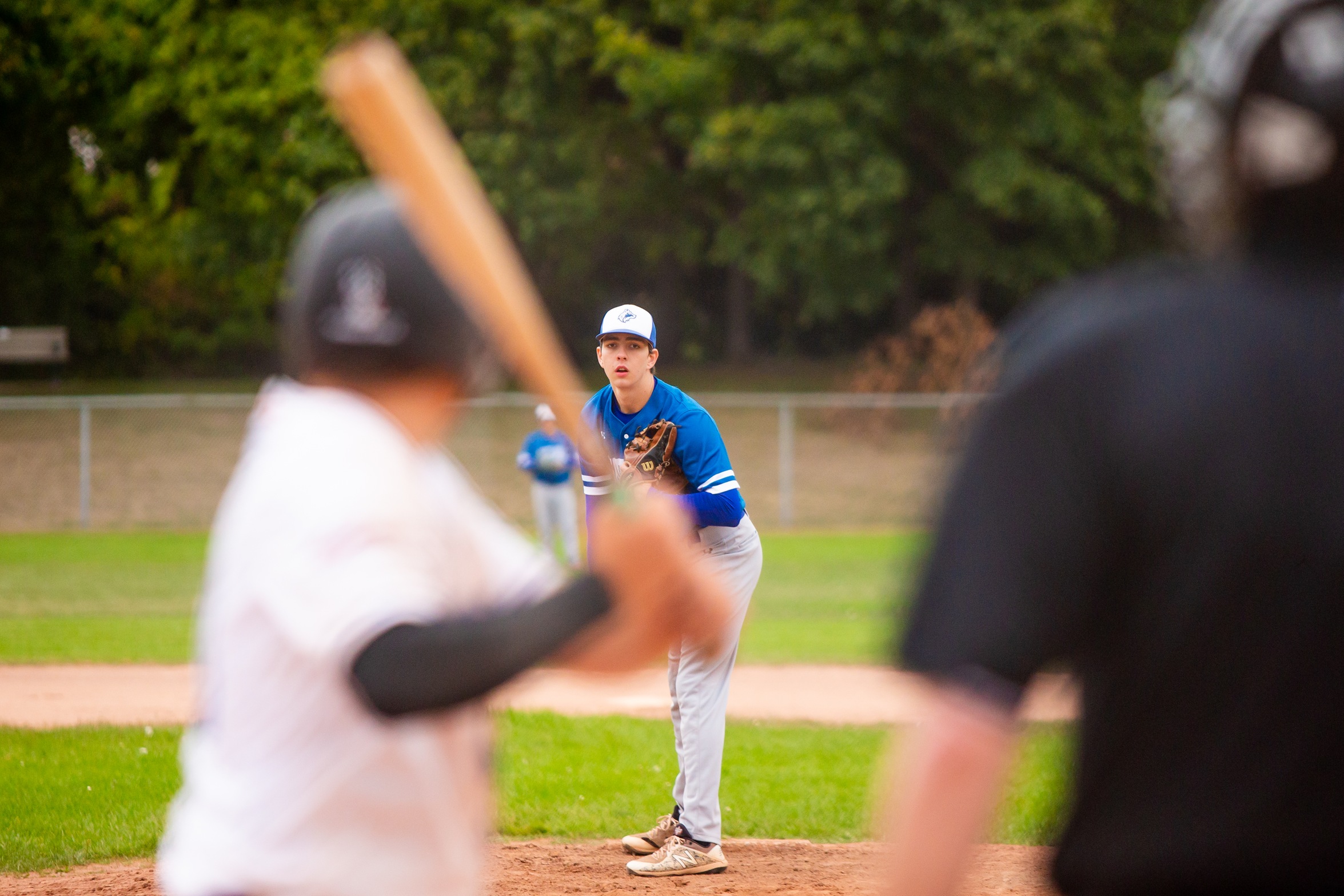Huskies pitcher Finlay Butler looks at batter before pitching