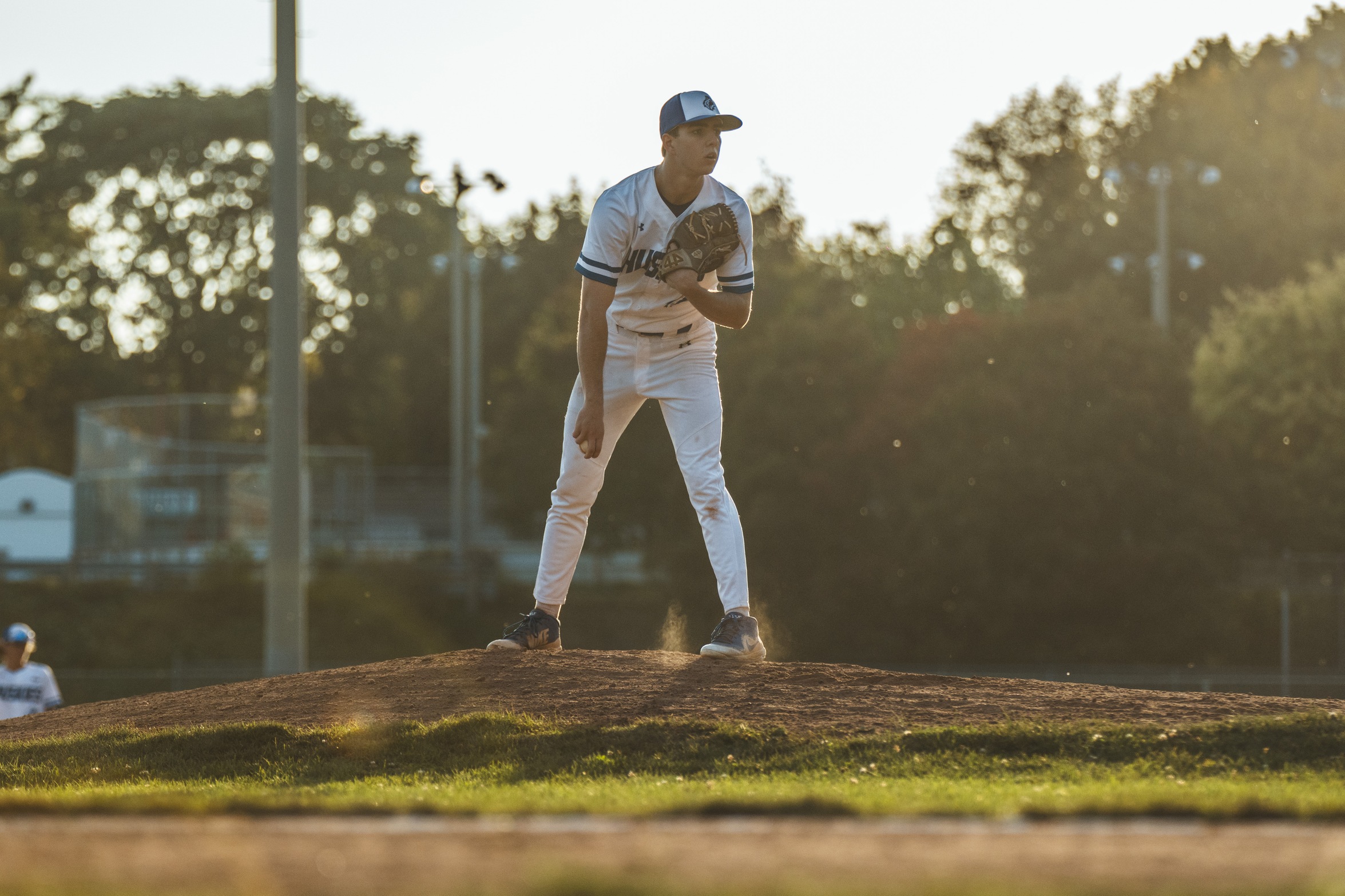 HUSKIES SPLIT WITH CENTENNIA