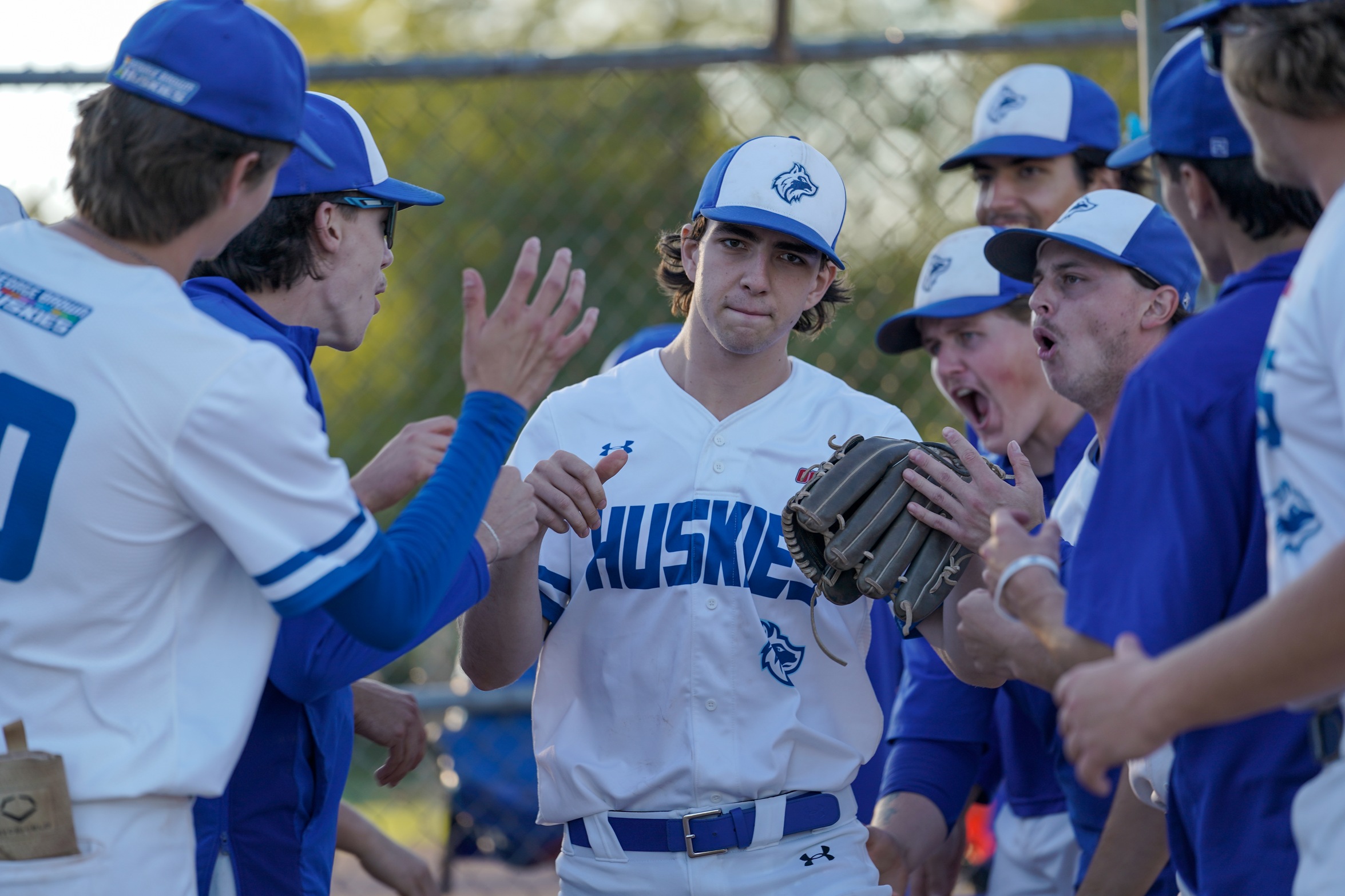 HUSKIES SPLIT WITH SHERIDAN