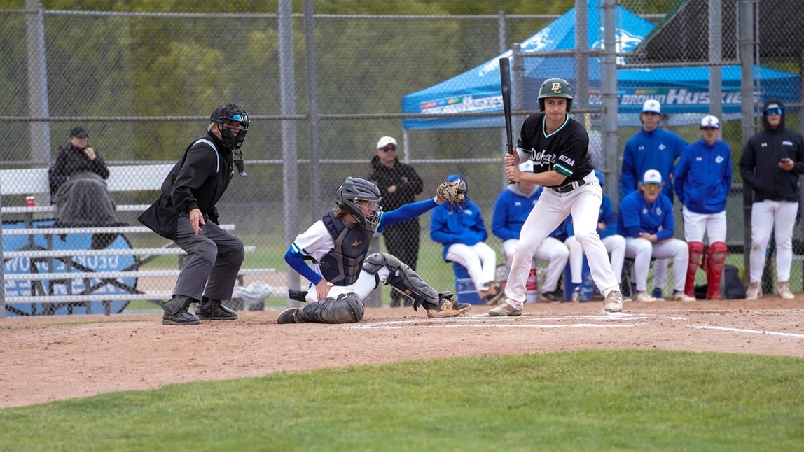 HUSKIES SWEPT IN HOME OPENER
