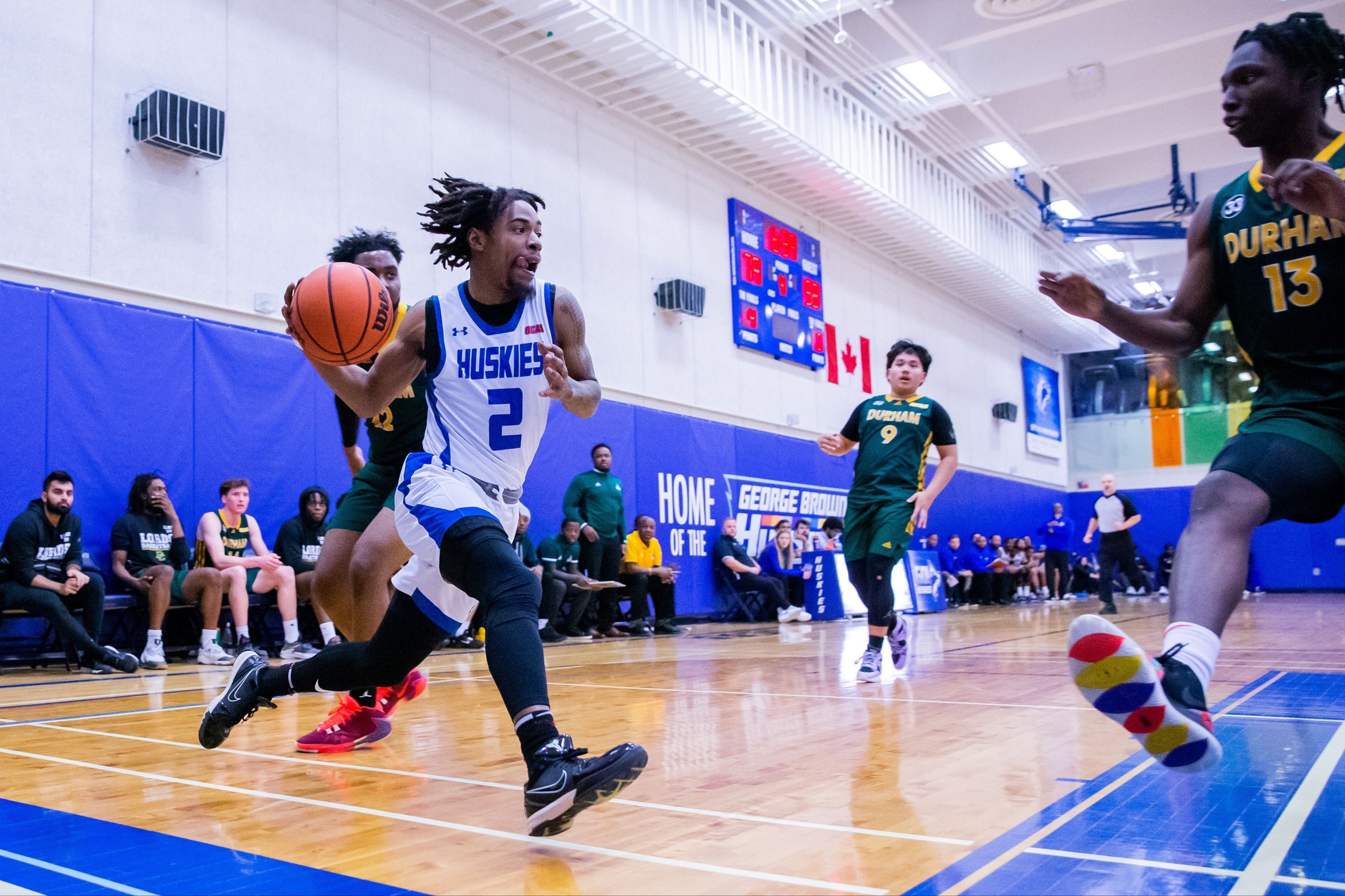 HUSKIES BASKETBALL SPLIT WITH THE LORDS