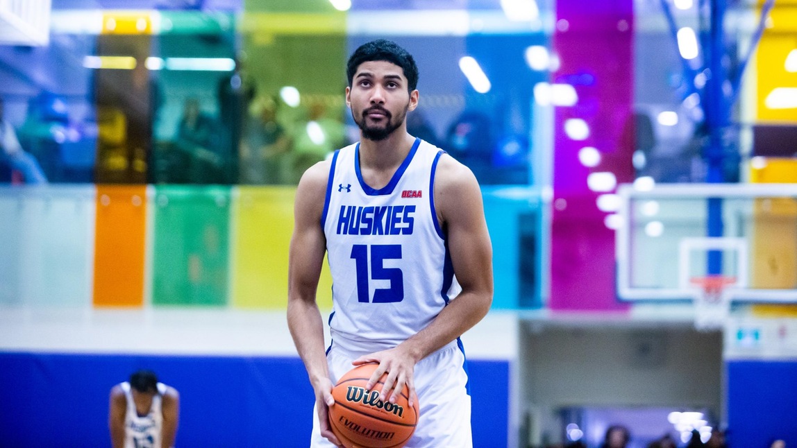 BROWN LEADS HUSKIES TO WIN OVER LANCERS
