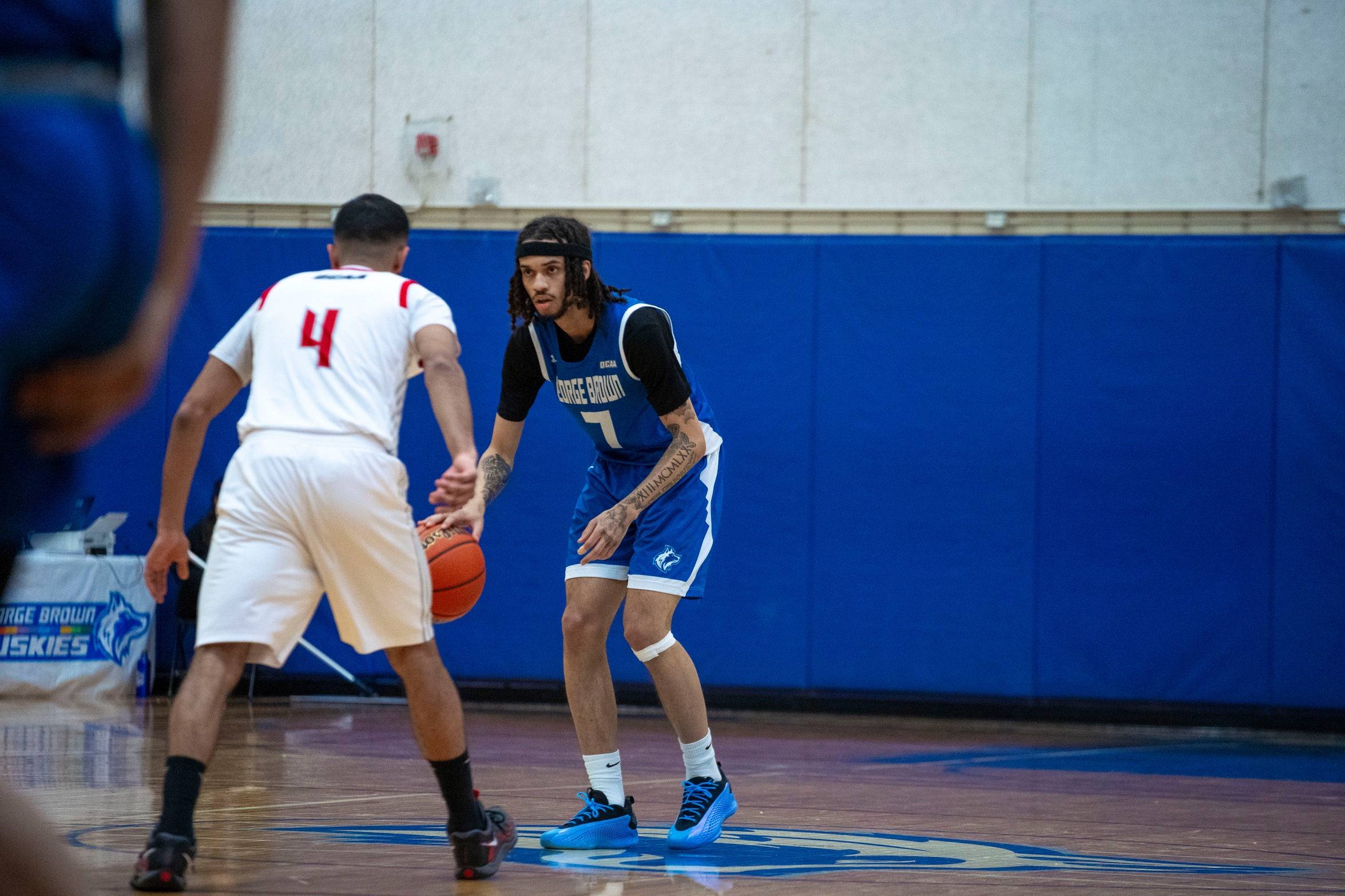HUSKIES BEAT SURGE IN OT