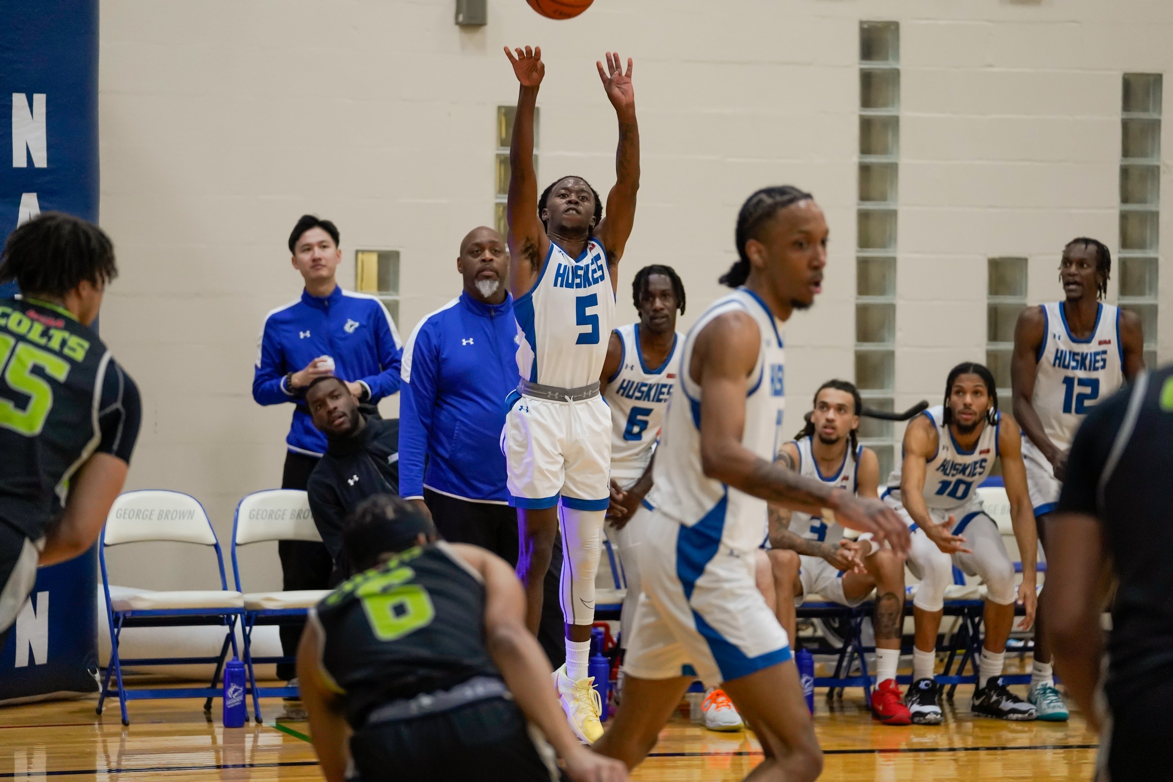 HUSKIES FALL IN OT TO COLTS