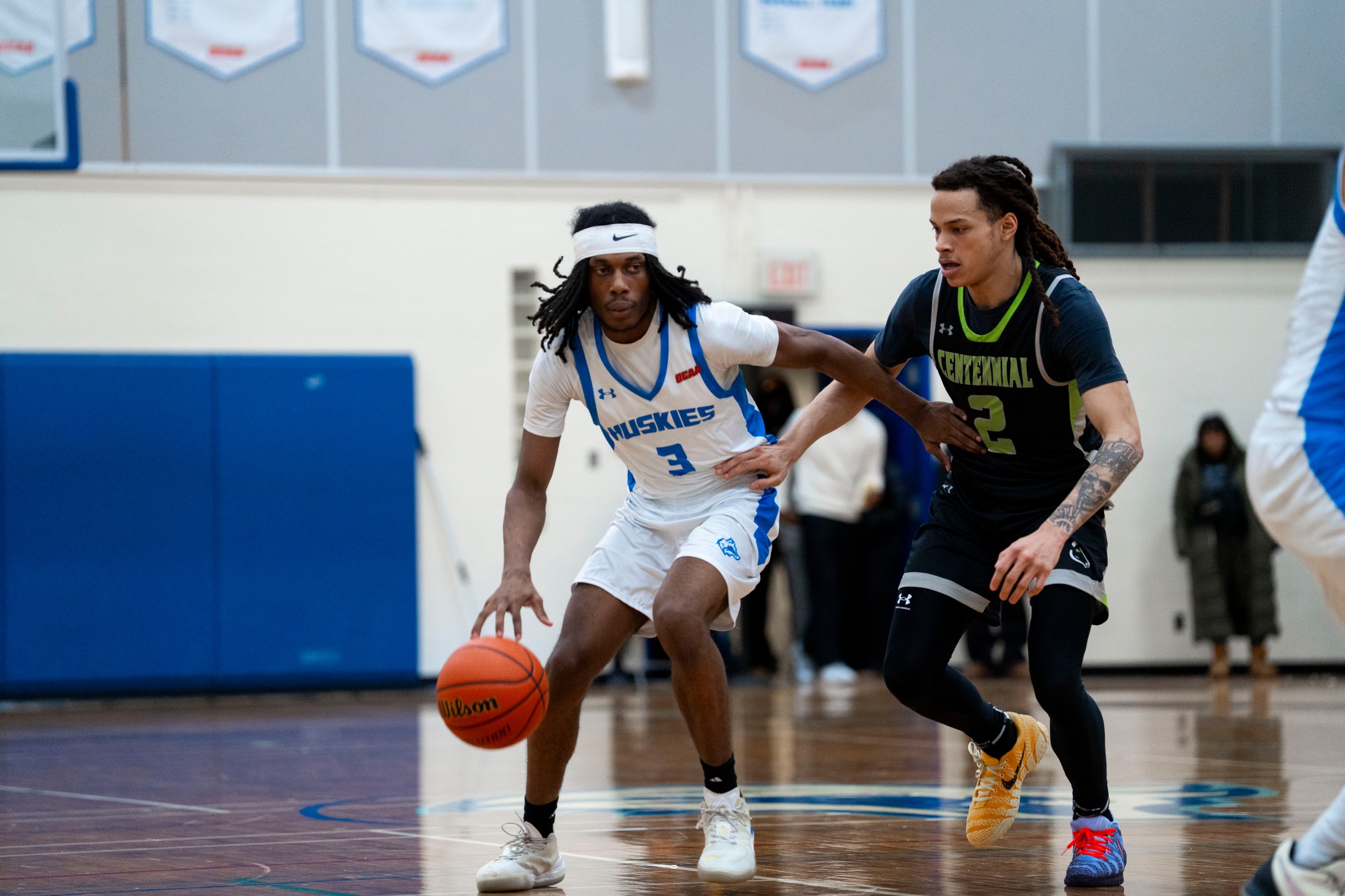 HUSKIES FALL TO CENTENNIAL
