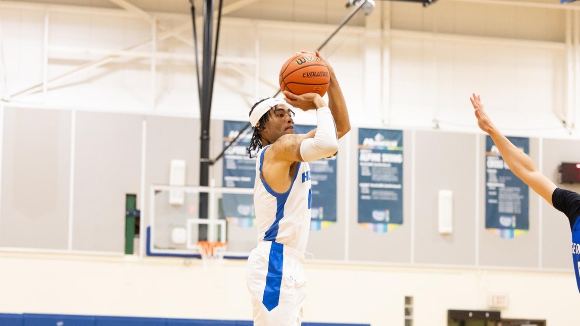 HUSKIES FALL TO CENTENNIAL