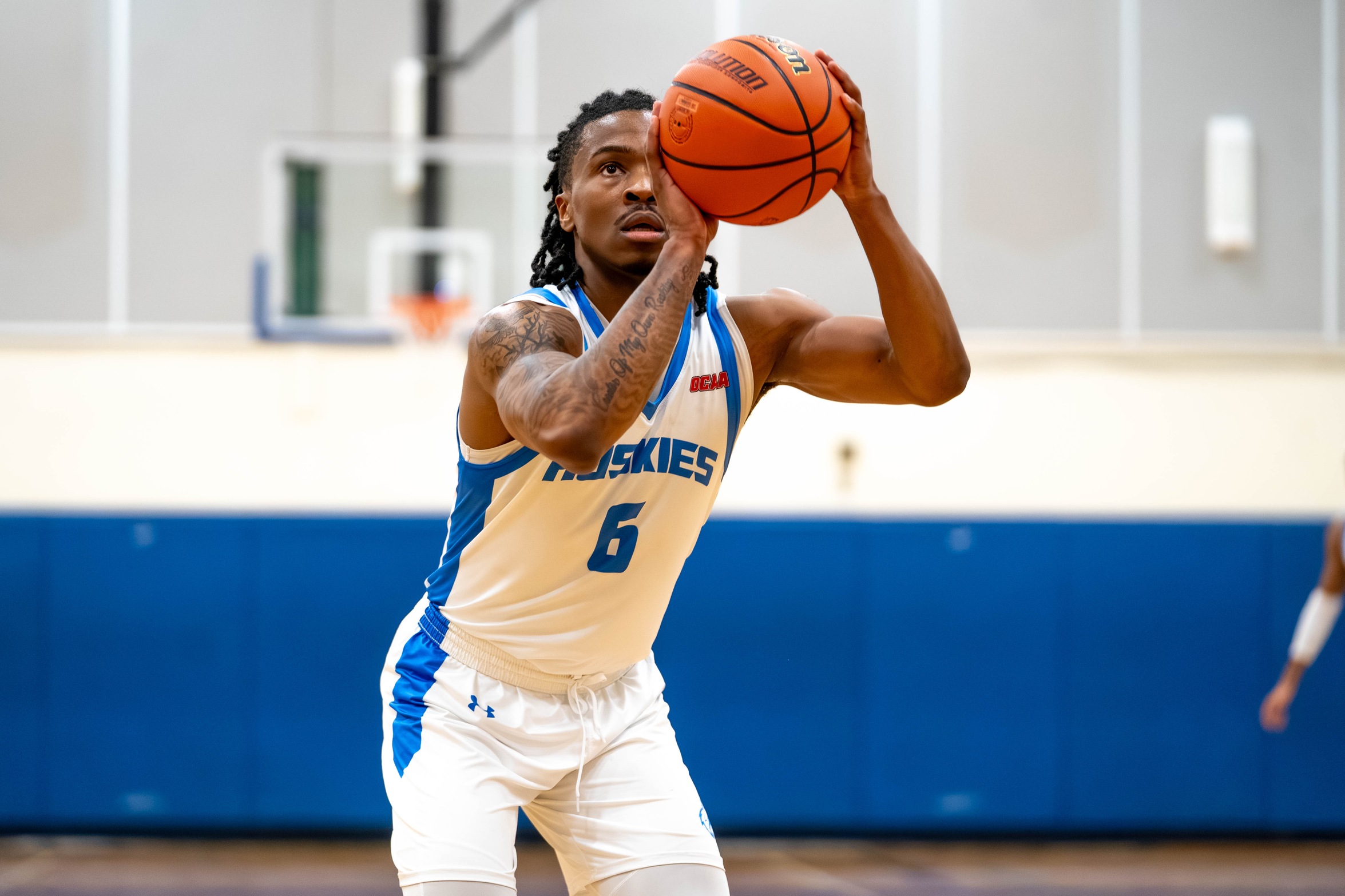 HUSKIES LOSE TO LOYALIST