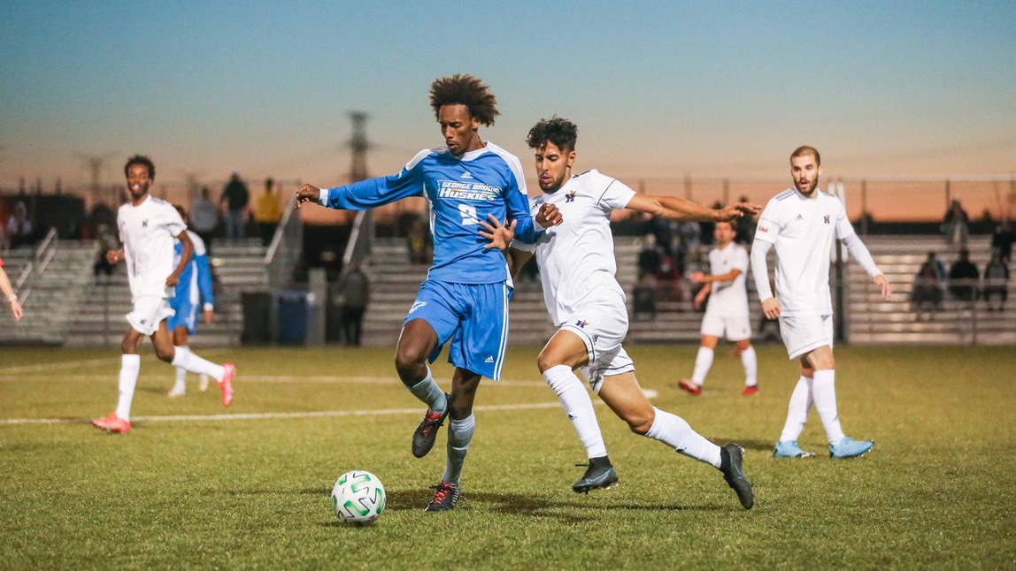 HUSKIES FALL TO No. 2 HAWKS