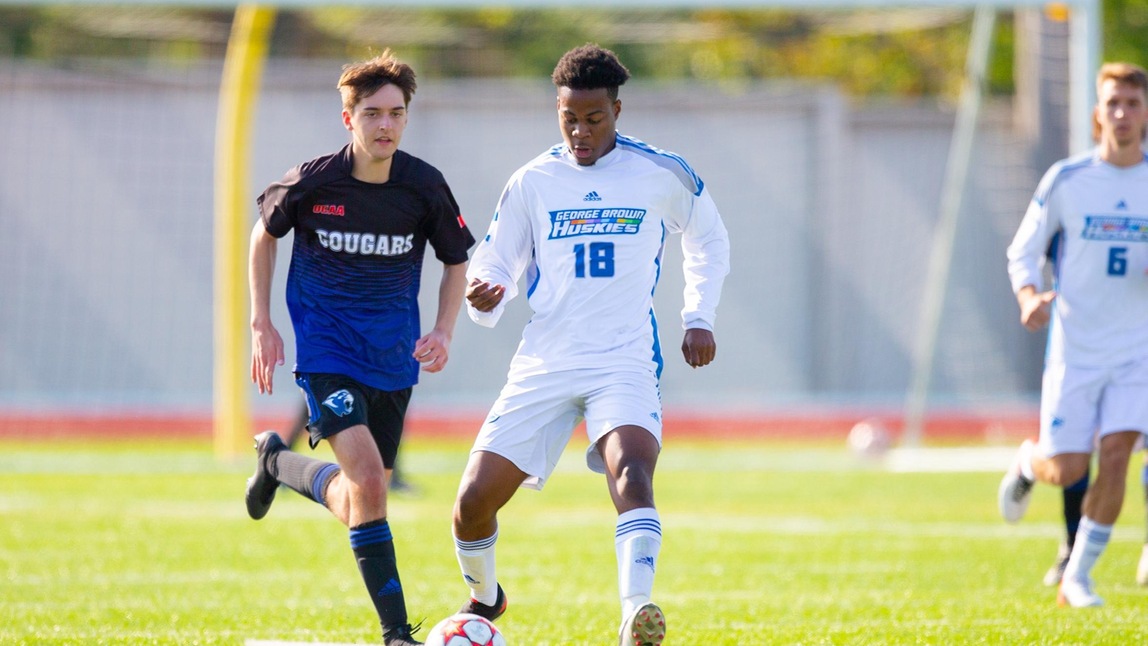 HUSKIES SHUTOUT COUAGRS