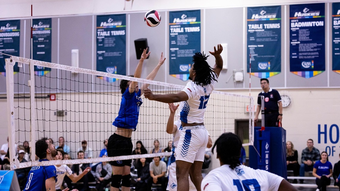 HUSKIES DROP FIVE-SETTER TO GEORGIAN