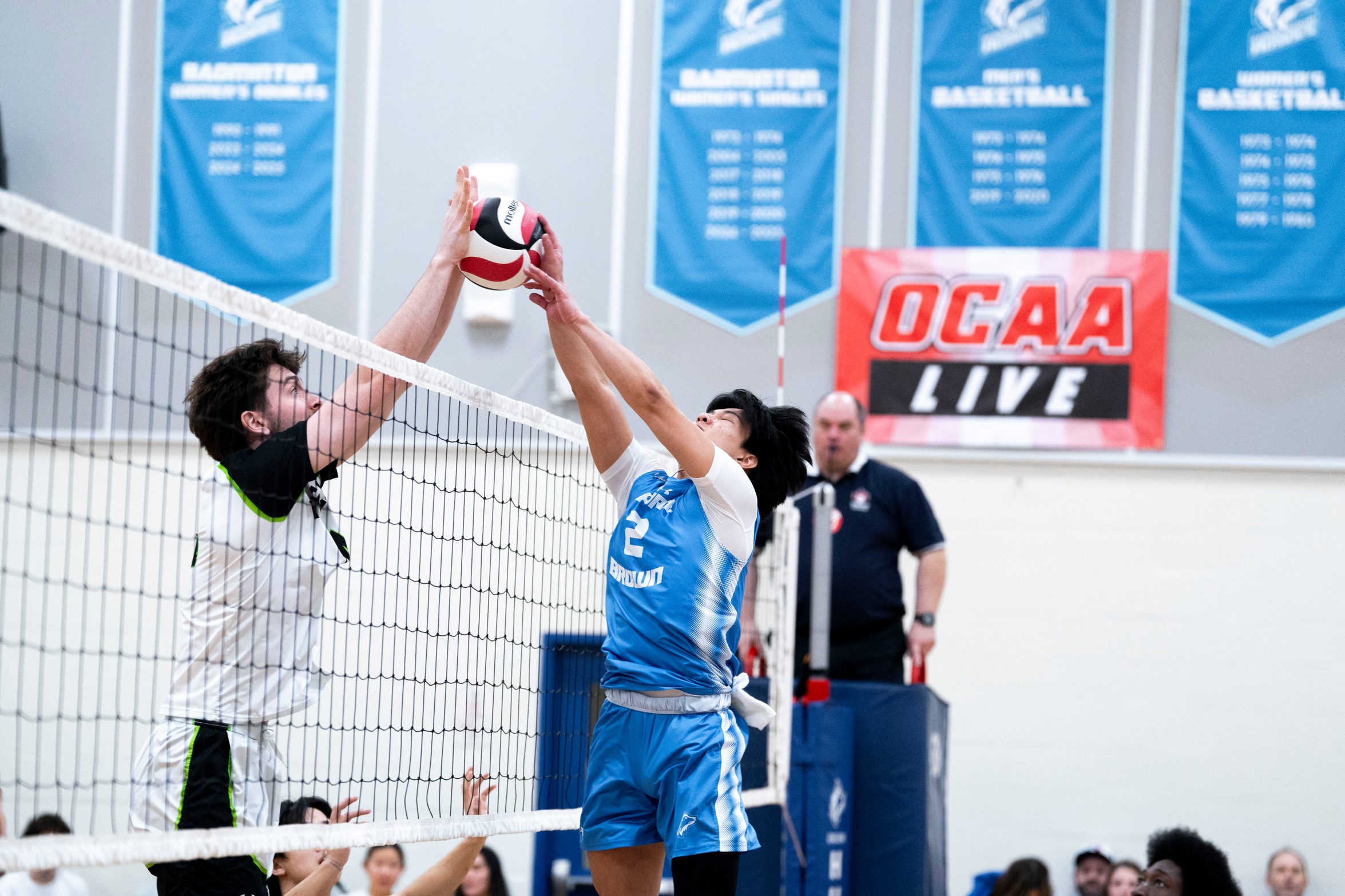 HUSKIES DROP FIVE-SETTER