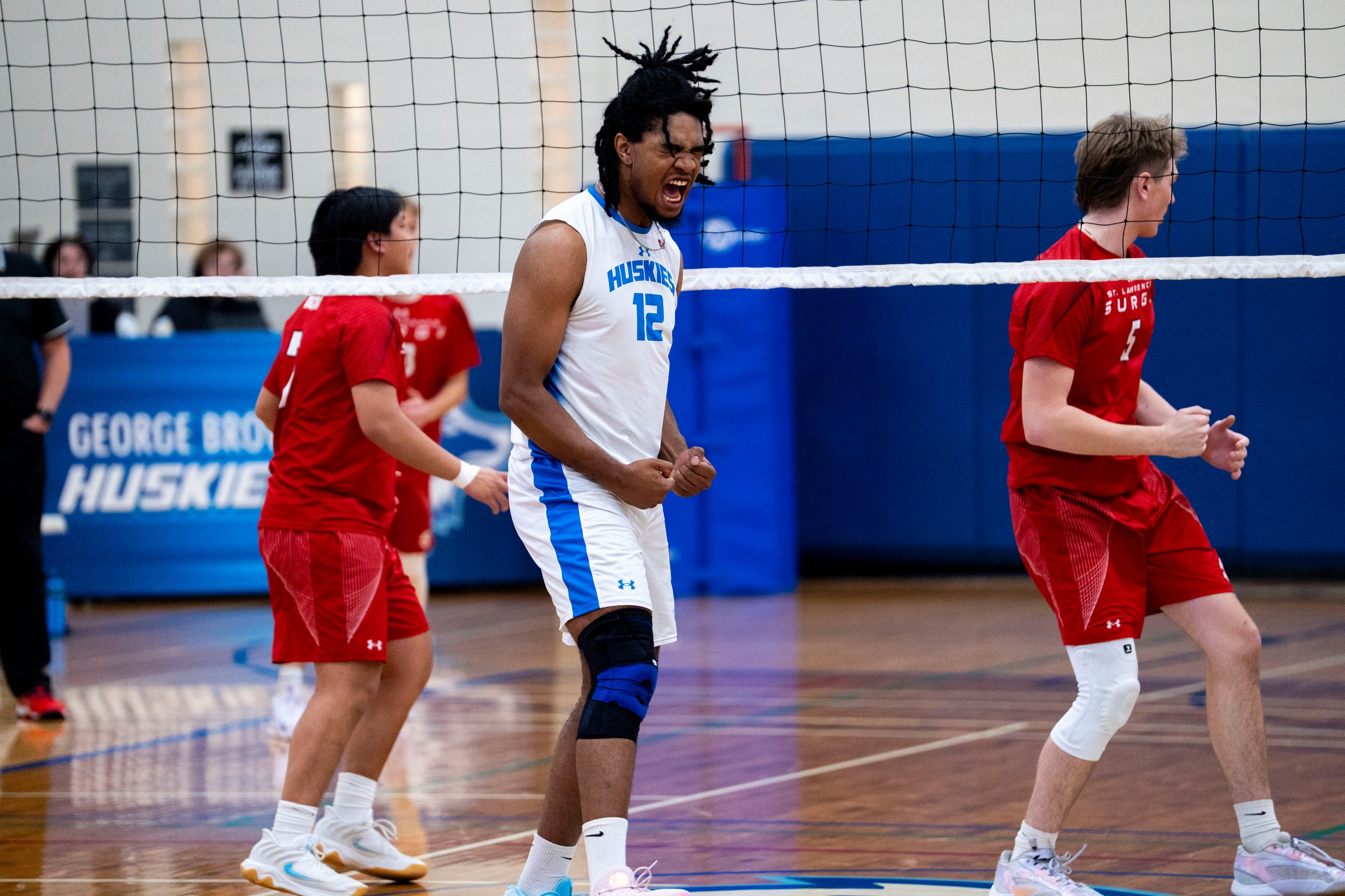 HUSKIES SWEEP SURGE