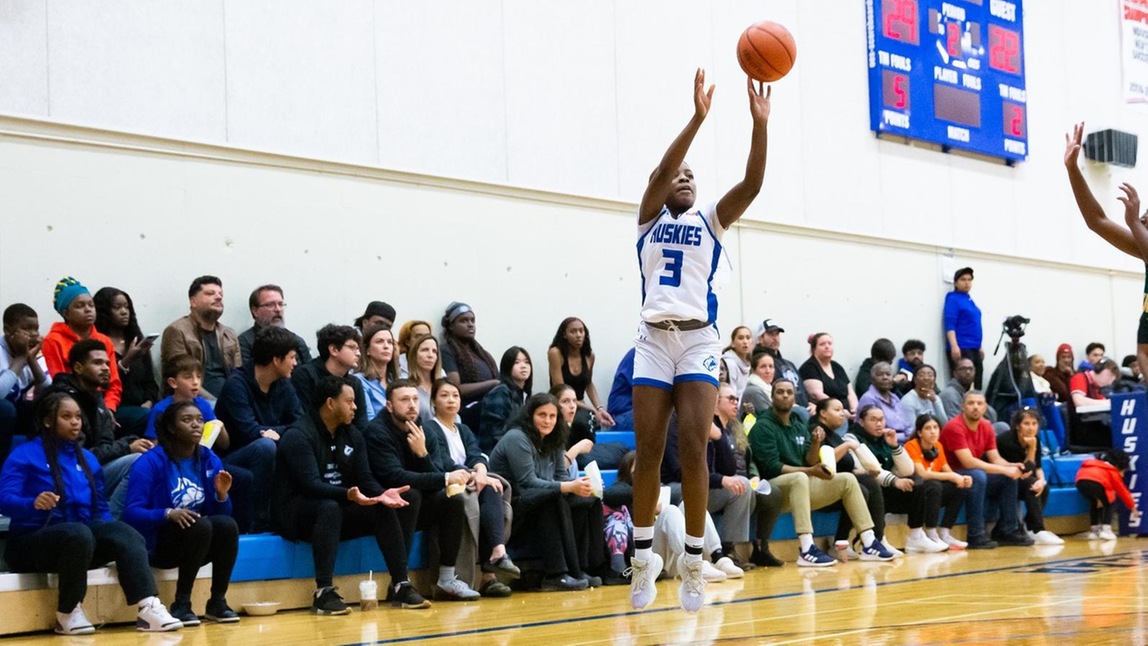 HUSKIES DROP CLOSE CONTEST TO GEORGIAN