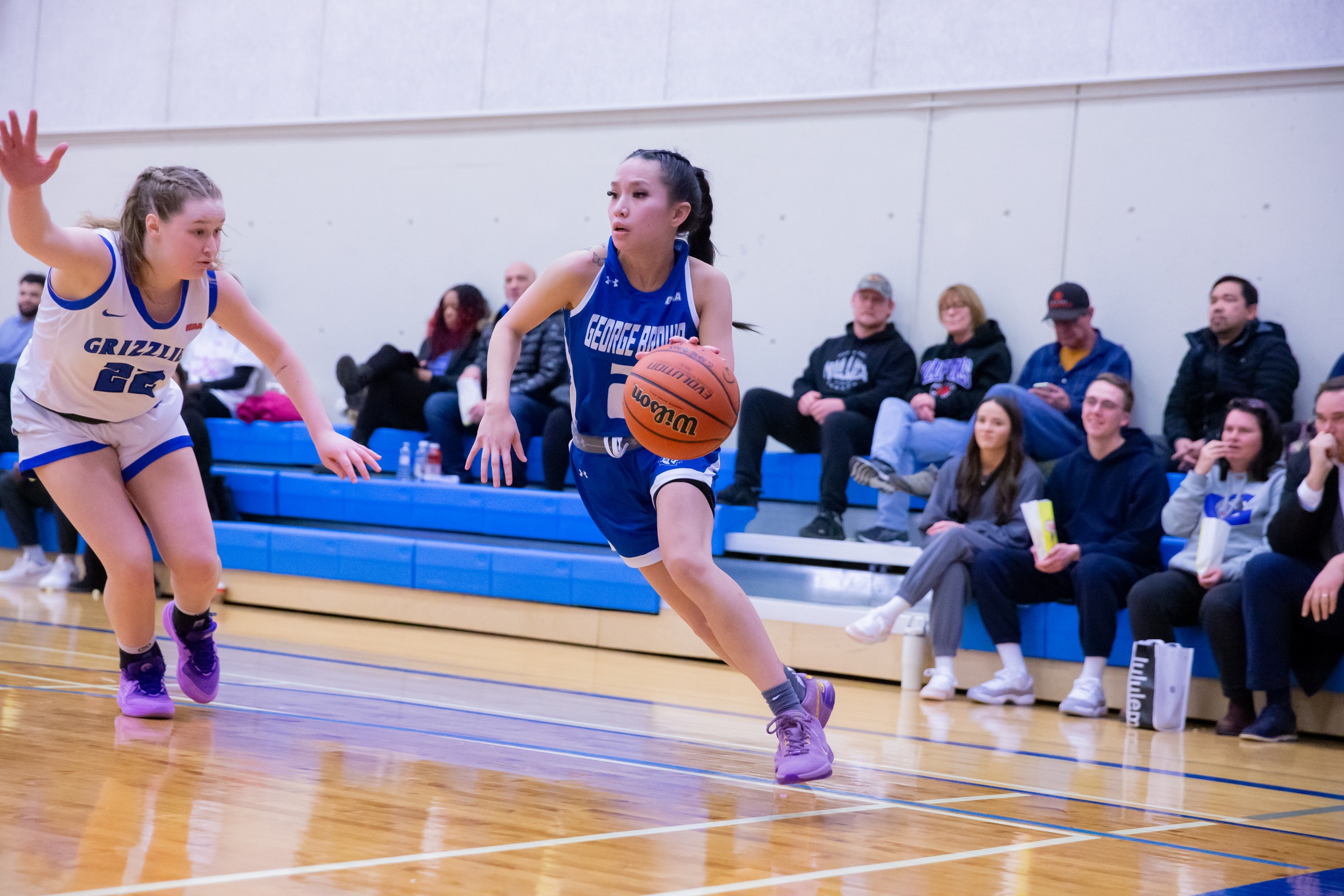 HUSKIES BATTLE BACK FOR WIN