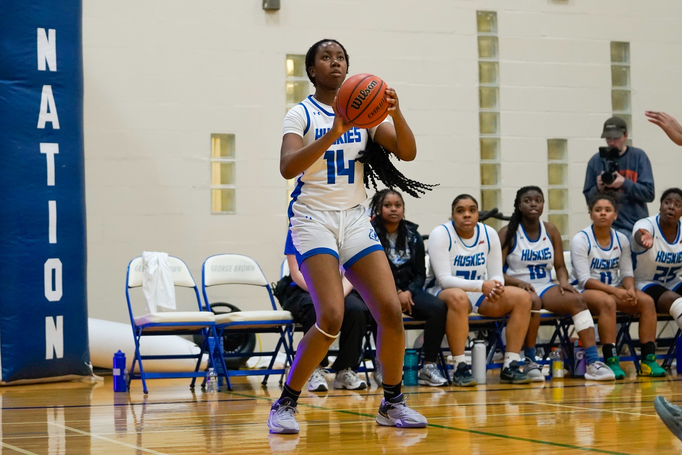 HUSKIES DEFEATED IN TIGHT GAME