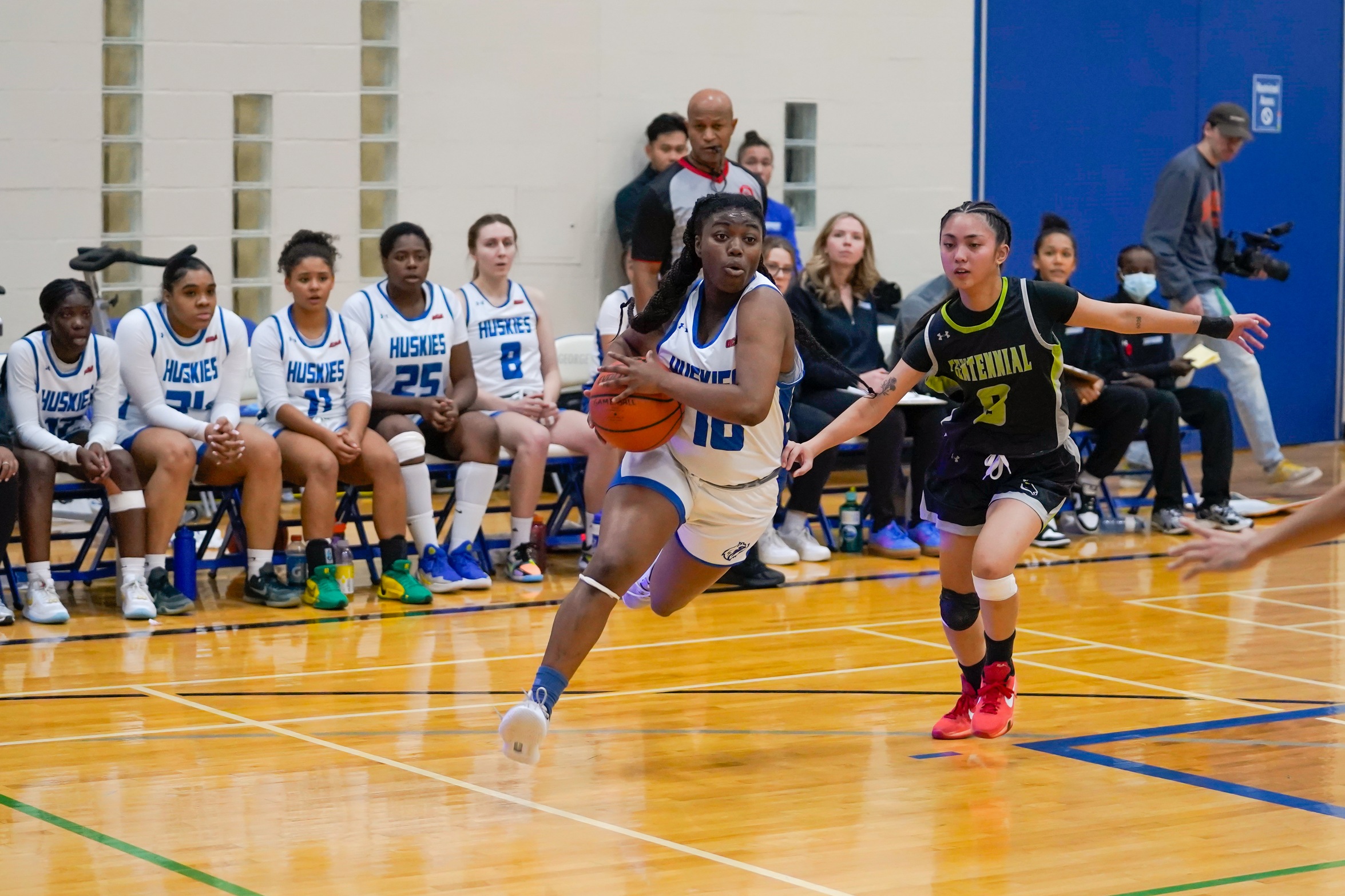 HUSKIES DROP DECISION TO CENTENNIAL
