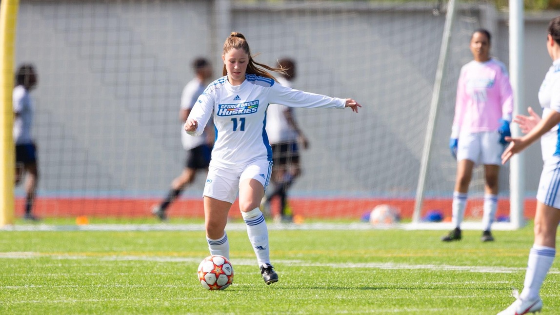 HUSKIES FALL IN QUARTERFINALS