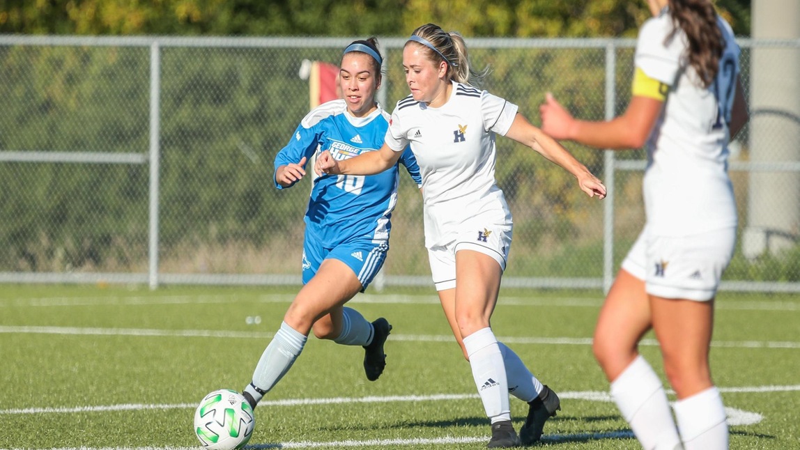 HUSKIES DROP DECISION TO No. 14 HAWKS