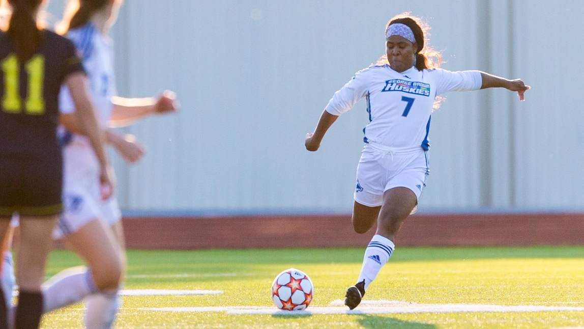 HUSKIES TAKE DOWN COUGARS